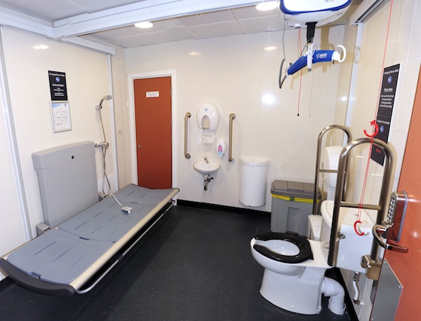 Birmingham Airport Changing Places facility which includes height adjustable benches, a hoist & more