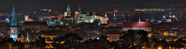 Planning a weekend in Poland: Photo Credit: Night view of Cracow by Ziarno - Own work. Licensed under CC BY-SA 3.0 pl via Commons.